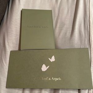 Authentic Van Cleef & Arpels envelope and certificate of authenticity